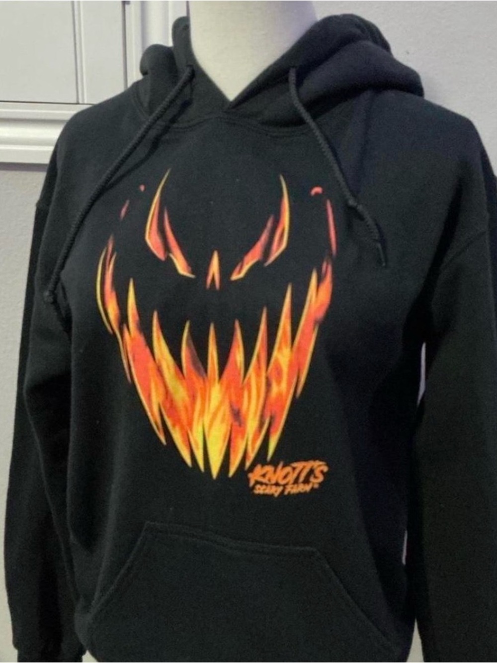 Men's Black Hoodie with Pumpkin Face Graphic
